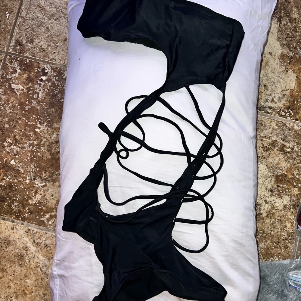 Top Motion one piece stringy swimsuit